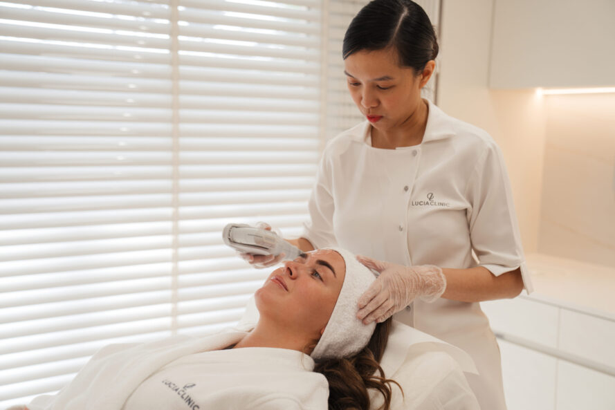 A woman getting Ultherapy Prime treatment at Lucia Clinic.