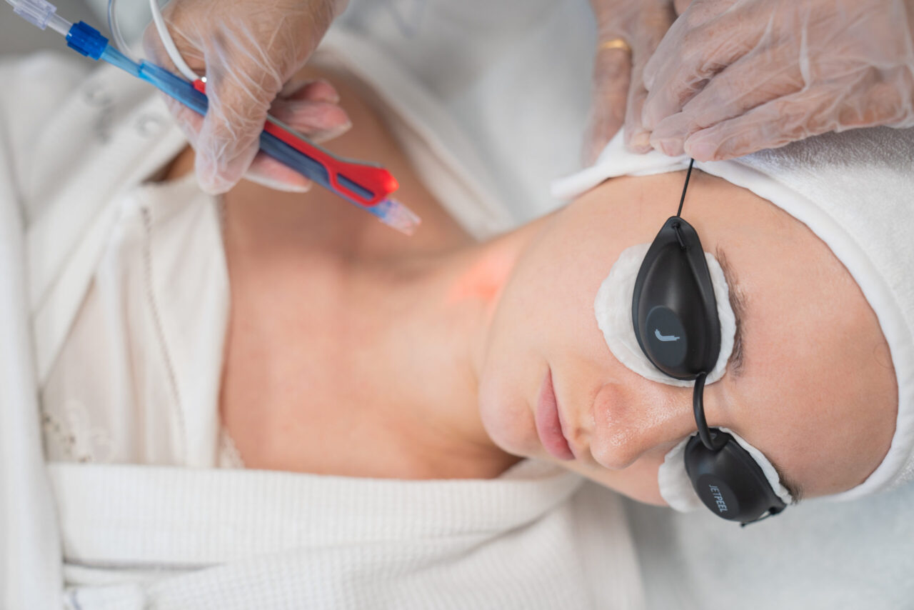 A woman getting one of the facial treatments Dubai