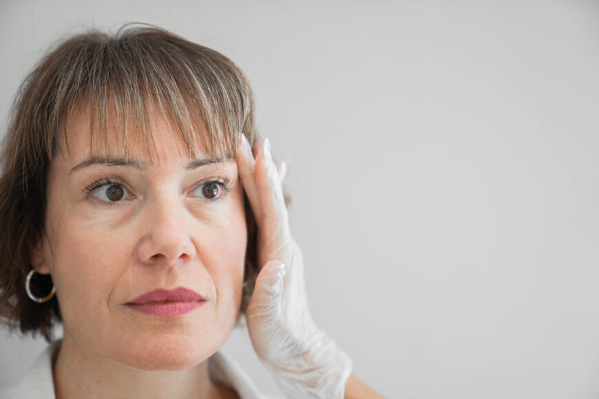 A woman getting ready for a plastic surgery that she got as a holiday gift