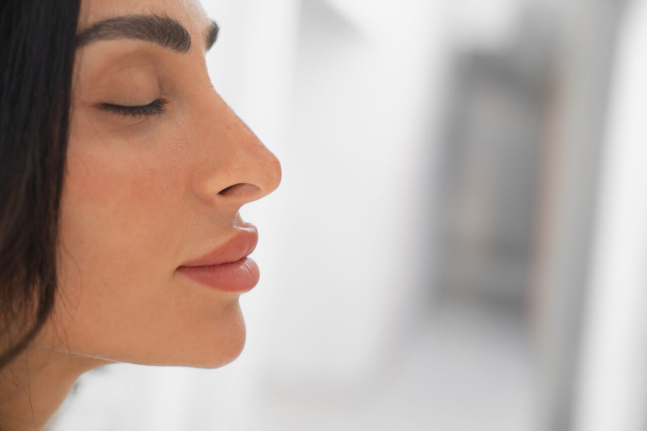 A woman after a plastic surgery during a festive season