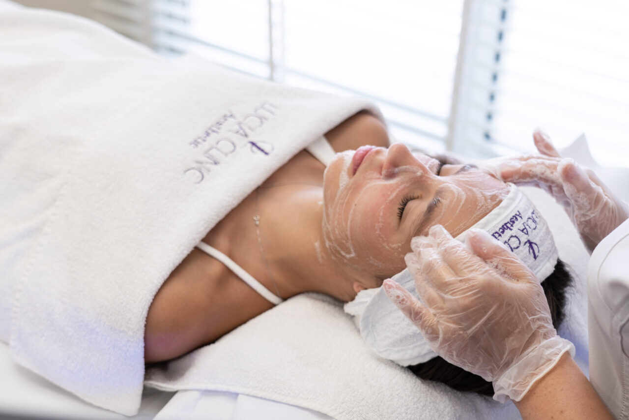 A woman getting a treatment for radiant complexion