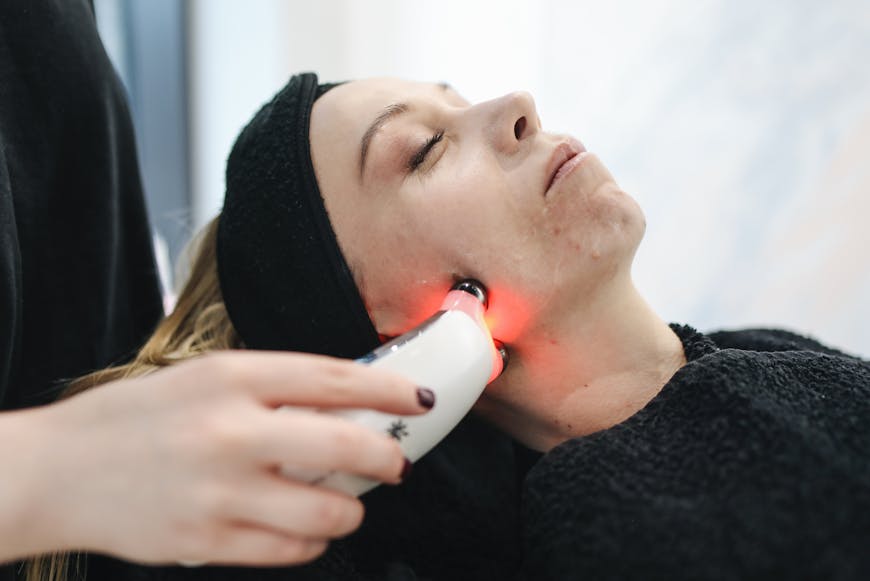 Woman receiving an IPL skin rejuvenation treatment in Dubai