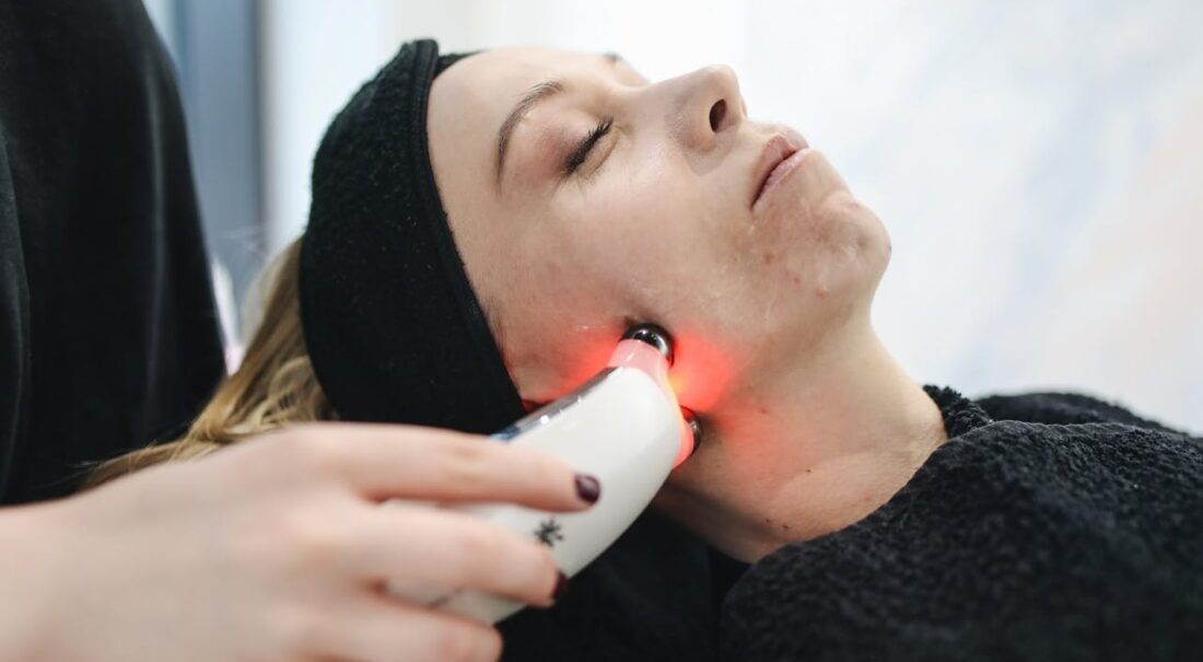 a woman having a laser facial treatment 