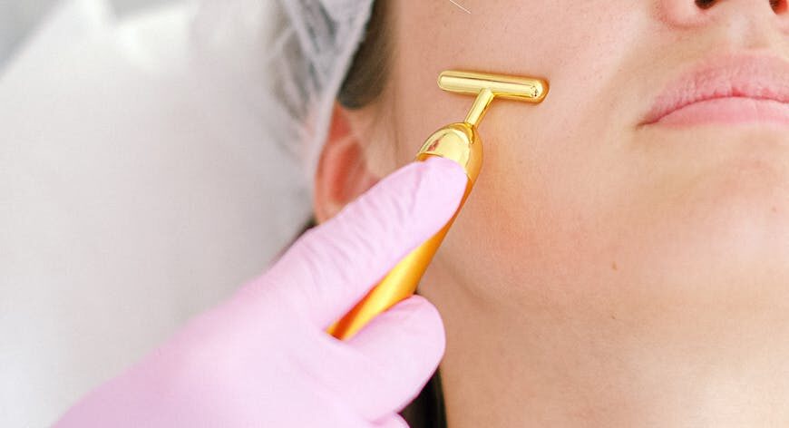 Woman getting a skinbooster shot on her cheek one of skin rejuvenation treatments dubai offers