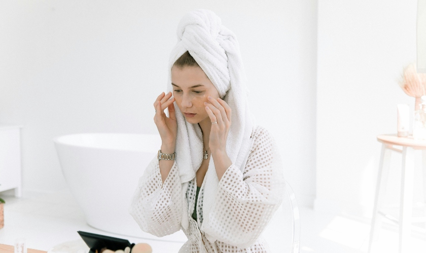 A woman doing skincare