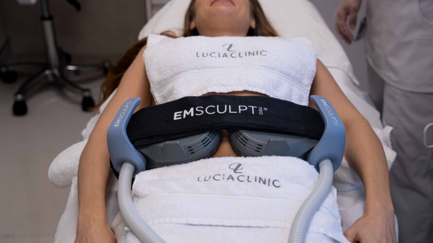 A woman getting a treatment after learning all about the difference between Emsculpt NEO and Emsculpt NEO Edge at Lucia Clinic.