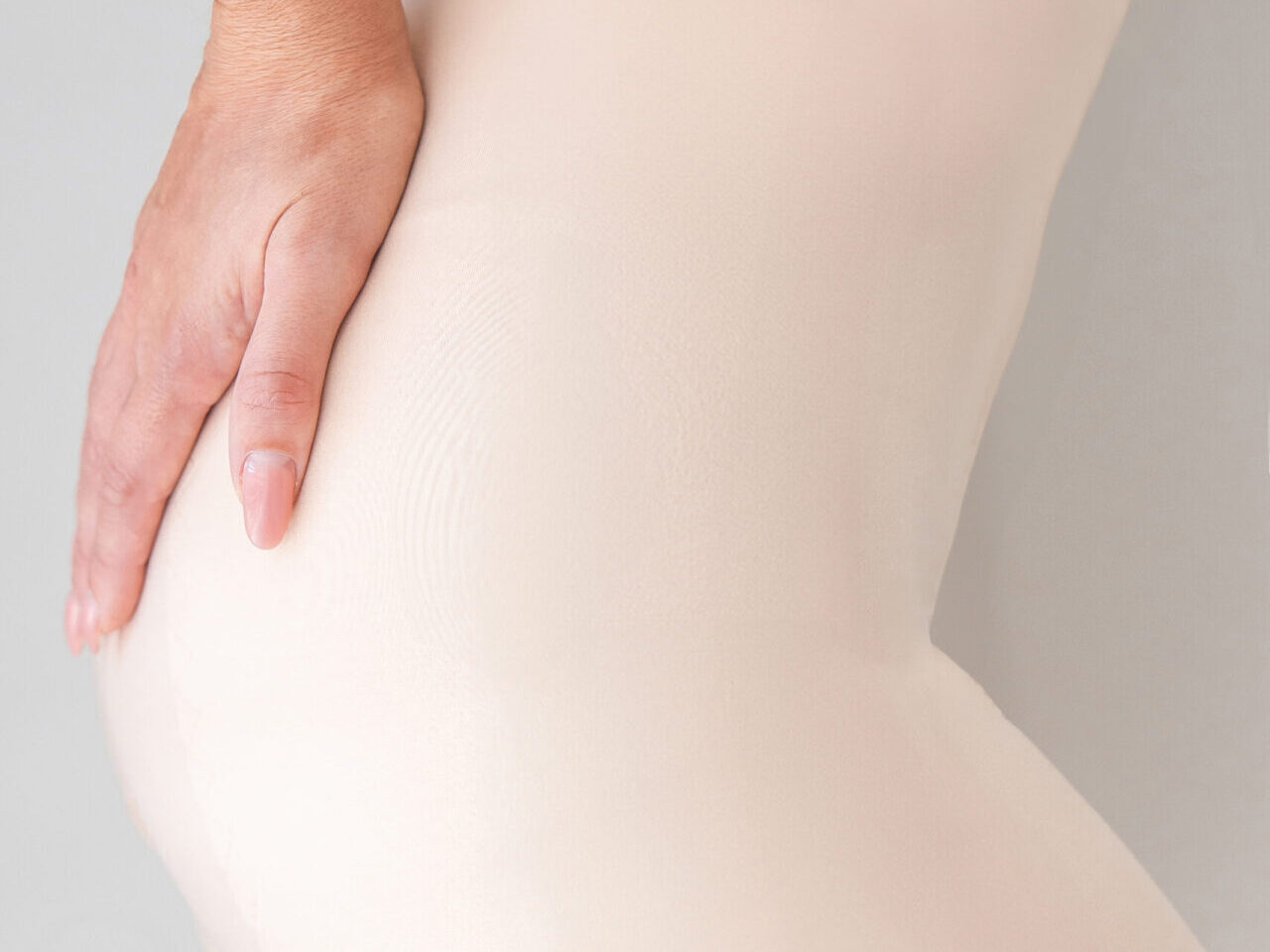 A woman after liposuction