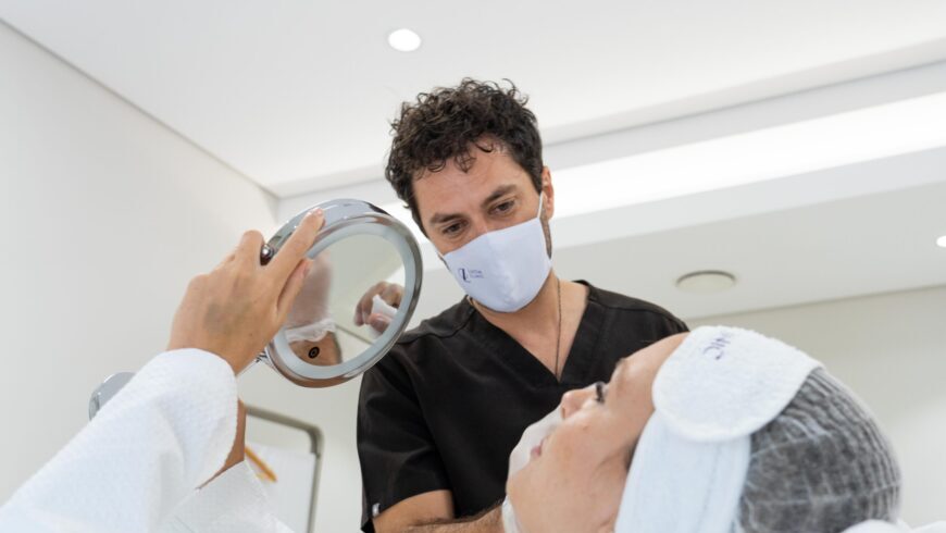 A doctor and a patient after rhinoplasty