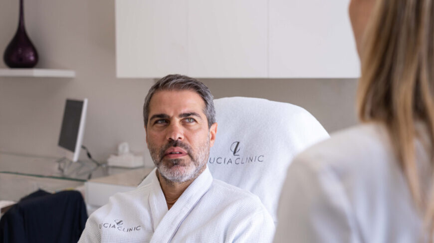 A man with deep frown lines getting botox