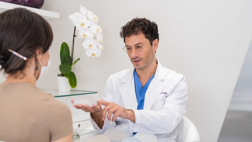 A Lucia Clinic surgeon discussing hybrid breast augmentation with Preservé and fat transfer during a consultation